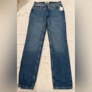 Never worn, dark blue, Free People, straight leg, jeans. Woman’s size 25.